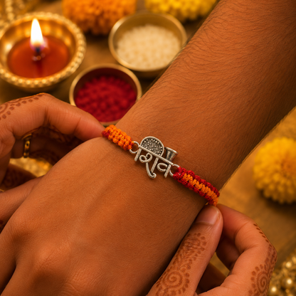 Premium Silver Shiv Rakhi with Handwoven Red Orange Thread