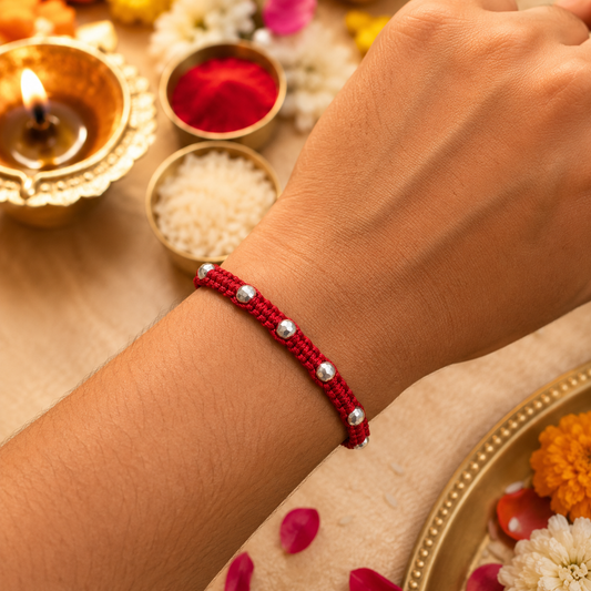 Premium Silver Beaded Rakhi Bracelet with Handwoven Red Thread