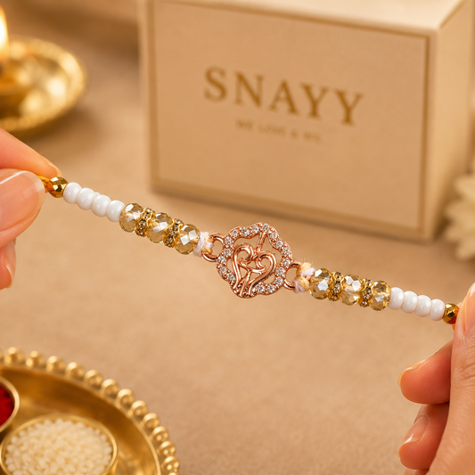 Gold Finish Om Rakhi with Pearl Beads