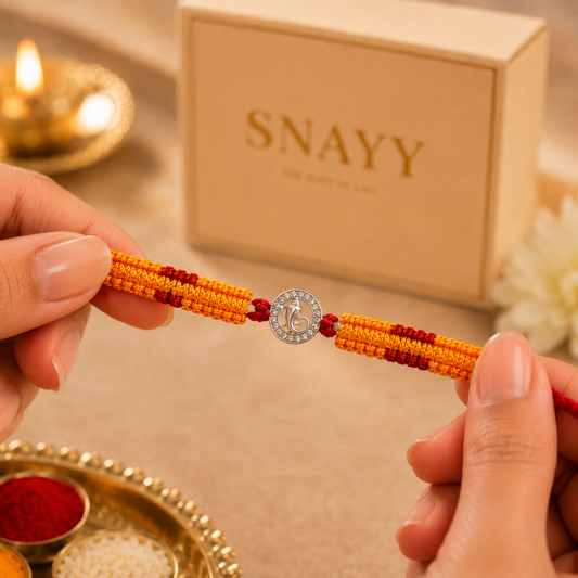 Silver Ganesha Rakhi with Handwoven Thread
