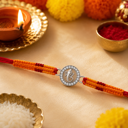 Silver Ganesha Rakhi with Handwoven Thread