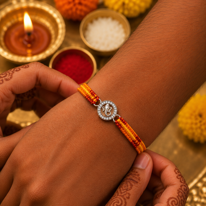Silver Ganesha Rakhi with Handwoven Thread