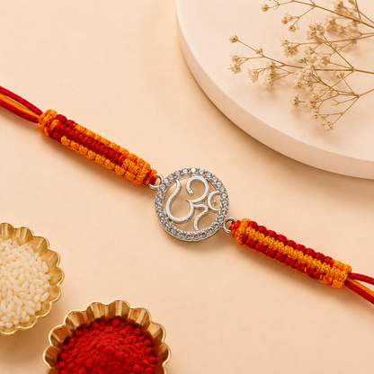 Premium Silver Om Rakhi with Sparkling CZ Stones & Handwoven Thread