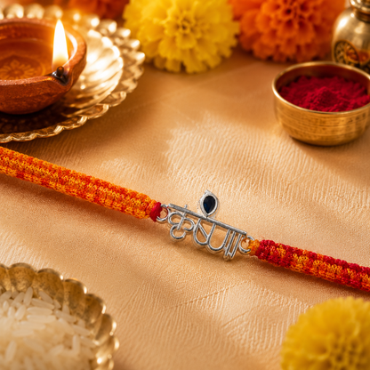 Premium Silver Krishna Rakhi with Blue Stone & Handwoven Thread