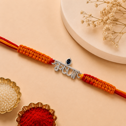 Premium Silver Krishna Rakhi with Blue Stone & Handwoven Thread